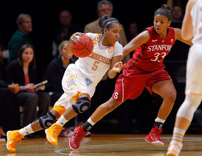 Tennessee guard Ariel Massengale (5) drives against Stanford guard Amber 
Orrange (33) in the first half Saturday in Knoxville, Tenn. ASSOCIATED 
PRESS