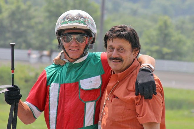 John Manzi's final story as a full-time employee at the Mighty M is on accomplished horseman Eddie Lohmeyer, left, who happens to be his cousin. Provided photo