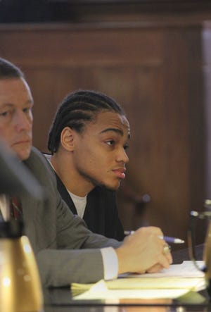 Russel Burrell, 19, was sentenced to four consecutive life sentences plus 10 years by Superior Court Judge Robert D. Krause, for his role in the robbery of a marijuana dealer that ended in a triple slaying in Providence.