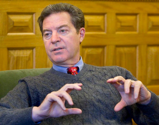 Gov. Sam Brownback discussed the state of the budget, defending cuts to the Kansas Public Employee Retirement System as necessary to protect state spending for public education, in an interview with The Topeka Capital-Journal in early December.