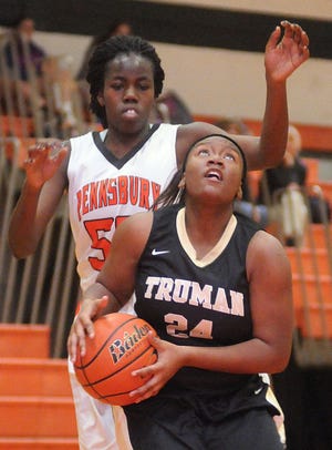 Harry S. Truman's Kira Rogers (24) shoots past Pennsbury's Sarah Antunrase (55) during their game at Pennsbury on Tuesday evening.