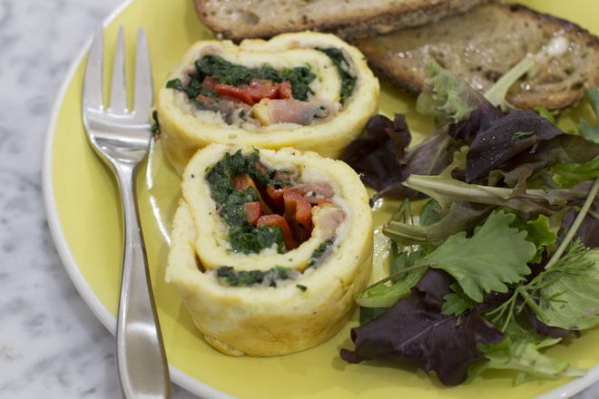 Egg Roulade Stuffed with Prosciutto, Spinach and Roasted Red Pepper takes some effort and skill, but most of the work can be done a day ahead.