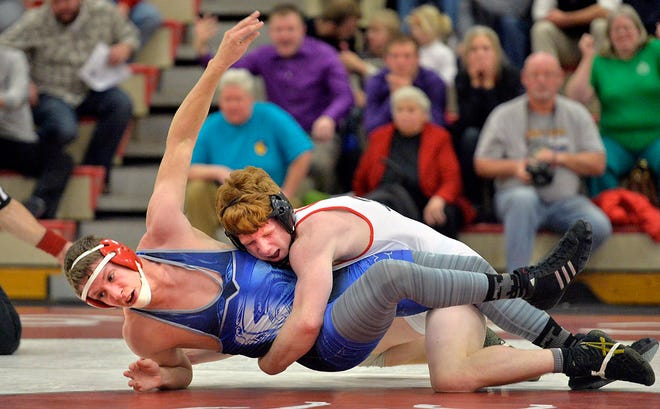 General McLane's Keller Watkins records a takedown of McDowell's Jared Carlson as part of Watkins' 12-1 major decision in their 152-pound wrestling match at General McLane in Washington Township on Dec. 23. McLane went on to defeat McDowell 45-15 in the Region 4 dual. ANDY COLWELL/