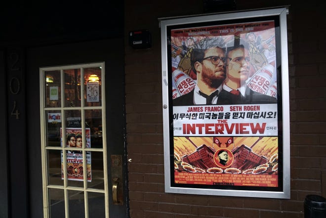 Tthe Cable Car Cinema & Cafe in Providence displays a poster for 'The Interview', which it will begin showing on Friday.