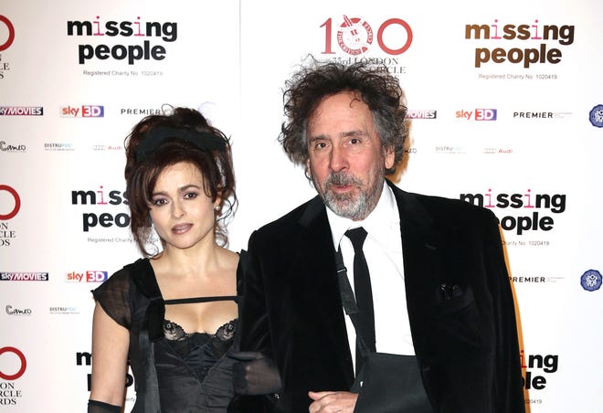 FILE - This Jan. 20, 2013 file photo shows, Helena Bonham Carter and Tim Burton at the 33rd London Critics Circle Film Awards at the May Fair Hotel in London. Longtime partners Carter and Burton have separated. A spokeswoman for Carter confirmed Tuesday, Dec. 23, 2014, that the couple split earlier this year. (Photo by Jon Furniss Photography/Invision/AP, File)