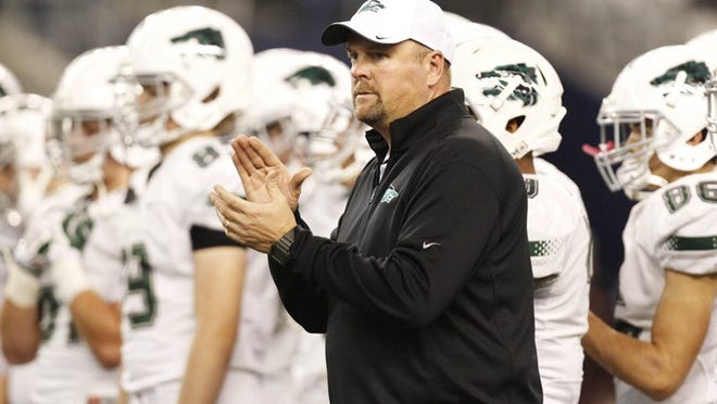 Cedar Park football coach Joe Willis, looking over his team before the start of the Class 5A, Division II title game last week, led the Timberwolves to victories in 10 of their last 12 games this season. He’s a leading a candidate to be named as the 2014 All-Centex coach of the year.