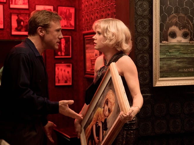 Christoph Waltz, left, and Amy Adams appear in a scene from "Big Eyes."
