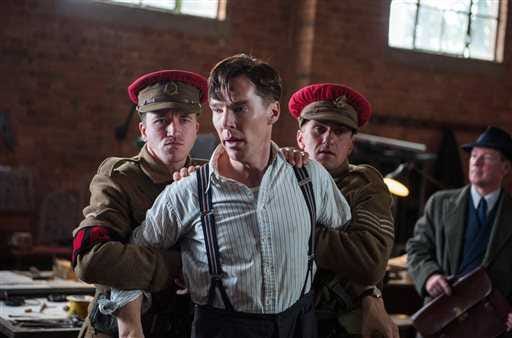 Benedict Cumberbatch, center, appears in a scene from "The Imitation Game," which has nominated for a Golden Globe for best drama.