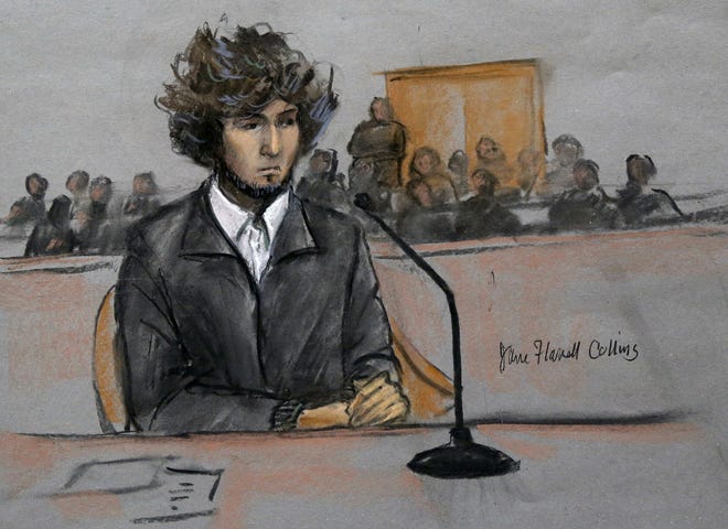 In this courtroom sketch, Boston Marathon bombing suspect Dzhokhar Tsarnaev is depicted sitting in federal court in Boston on Dec. 18 for a final hearing before his trial begins in January.

AP Photo/Jane Flavell Collins