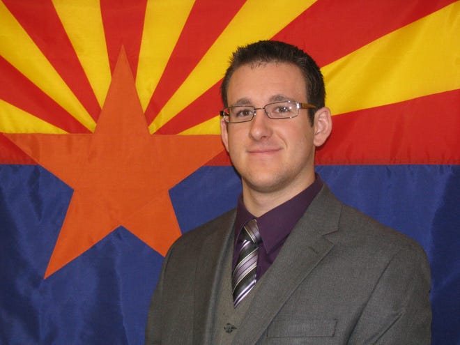 This Nov. 27, 2008 photo released by the Flagstaff Police Department, shows police officer Tyler Stewart. Officer Stewart, 24, died Saturday, Dec. 27, 2014, at Flagstaff Medical Center after he was shot by a suspect in a domestic-violence case, police said. Stewart was looking for the suspect about 1:30 p.m. in the 800 block of West Clay Street when a man identified as Robert W. Smith, 28, of Prescott, fired several shots at the officer, police said. The suspect then shot himself dead, police added. Stewart had worked at the department for less than a year, police said. (AP Photo/Flagstaff Police Department)