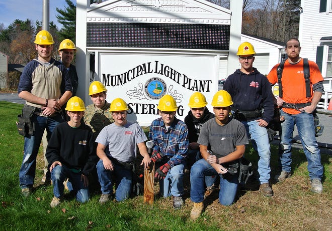 Students in Monty Tech'­s industrial technology program are working with the Sterling Municipal Light Department employees to refurbish the 130-year-old building. Shown are (from left) Jon Raymond, of Athol, Bill Stuessy, teacher, Connor Welsh, of Barre, Patrick Meyer, of Holden, Tevin Hasselmann, of Hubbardston, Robert Nealon, of Fitchburg, Eric Orsula, of Lunenburg, Kobie Smith, of Fitchburg, Wes LeBlanc, of Templeton and Tim Gray, light department line man.