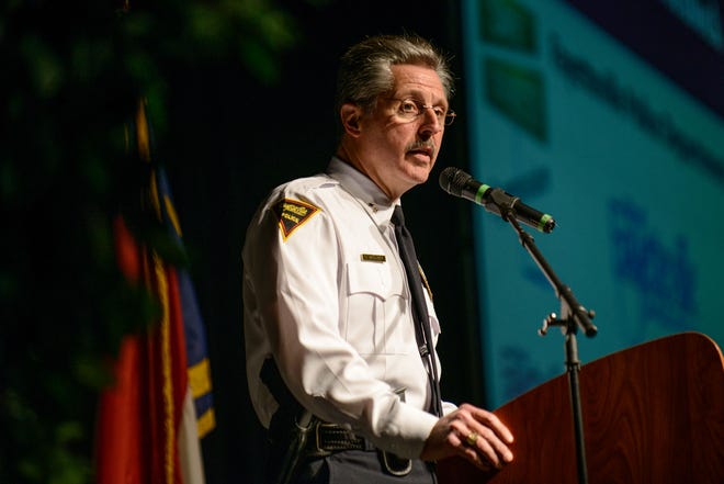 Fayetteville Police Chief Harold Medlock speaks at the Safe Streets Symposium Friday April 11, 2014.