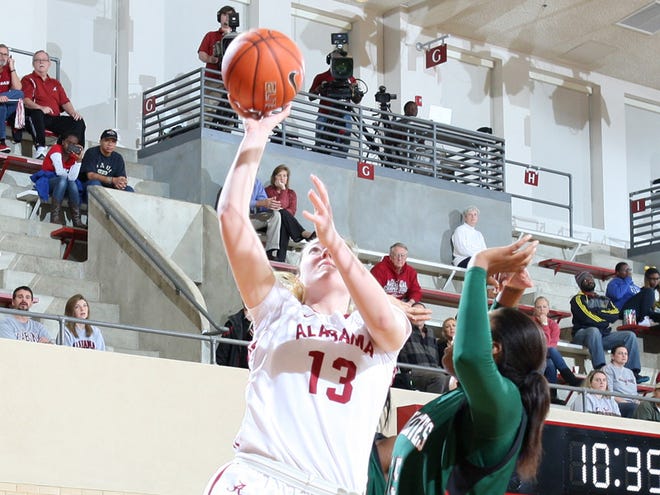 Alabama’s Nikki Hegstetter (13) goes up for a layup during Sunday’s game against Mississippi Valley State at Foster Auditorium. The Crimson Tide won, 71-40. Hegstetter led Alabama in scoring with 15 points.