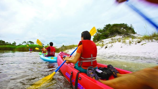 Kayakers explore Grayton Beach in the Panhandle. Contributed