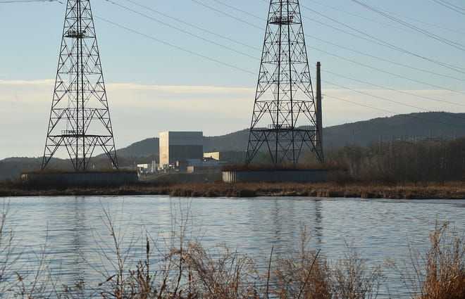 The waters of the Connecticut River reservoir in front of the Vermont Yankee nuclear power plant, which shut down Monday after 42 years.