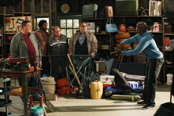 Billy Gardell, left, as Mike Biggs, Nyambi Nyambi as Samuel, Louis Mustillo as Vince, David Higgins as Harry, and Reno Wilson as Carl McMillan are shown in a scene from 'Mike & Molly.'