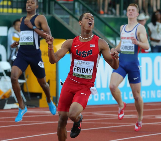 Cherryville's Trentavis Friday celebrates his win in the national junior championships in Eugene, Ore. Friday, a 2014 Cherryville High graduate, is currently a freshman at Florida State University.