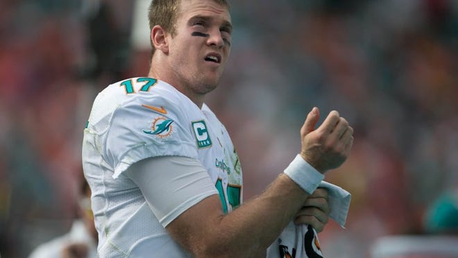 Quarterback Ryan Tannehill, who just completed his third season and has never missed a start, could fill the leadership void that afflicts the Dolphins. (Allen Eyestone / The Palm Beach Post)