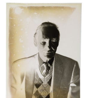 This photo of author William S. Burroughs was taken by Bob Blank of Hixon Studios in Lawrence during a previously unseen portrait session in 1983.