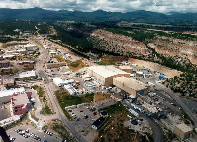 FILE - This undated file aerial view shows the Los Alamos National laboratory in Los Alamos, N.M. New Mexico on Saturday, Dec. 6, 2014, levied more than $54 million in penalties against the U.S. Department of Energy for numerous violations that resulted in the indefinite closure of the nation's only underground nuclear waste repository. The state Environment Department delivered a pair of compliance orders to Energy Secretary Ernest Moniz, marking the state's largest penalty ever imposed on the agency. (AP Photo/Albuquerque Journal)