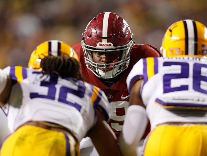 Alabama linebacker Reggie Ragland, center, is second on the team with 88 tackles this season.
