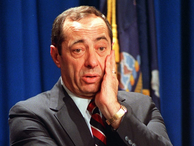 In this April 5, 1988, file photo, New York Gov. Mario Cuomo listens to a reporter's question during news conference held to discuss the state budget at the Capitol in Albany, N.Y. Cuomo, a three-term governor, died Thursday, Jan. 1, 2015, the day his son Andrew started his second term as governor, the New York governor's office confirmed. He was 82