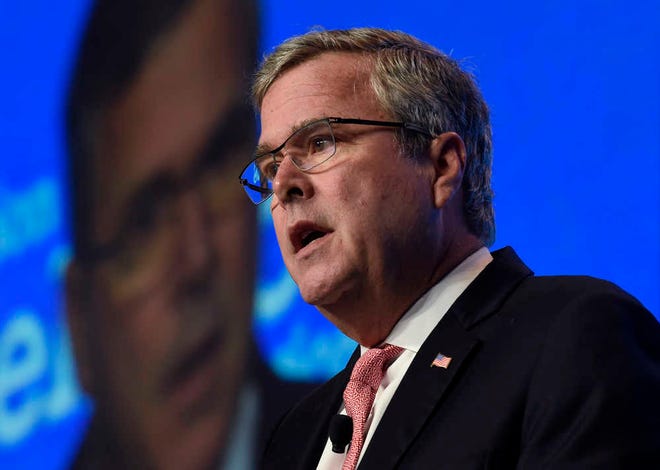 FILE - In this Nov. 20, 2014 file photo, former Florida Gov. Jeb Bush speaks in Washington. There's a whole year of campaigning, positioning and politicking to go before the next campaign for president kicks off with the Iowa Caucus in early 2016. Here's a look at 10 things to look out for next year that might tell us something about how that campaign to come (which is really already underway) may shake out. (AP Photo/Susan Walsh, File)
