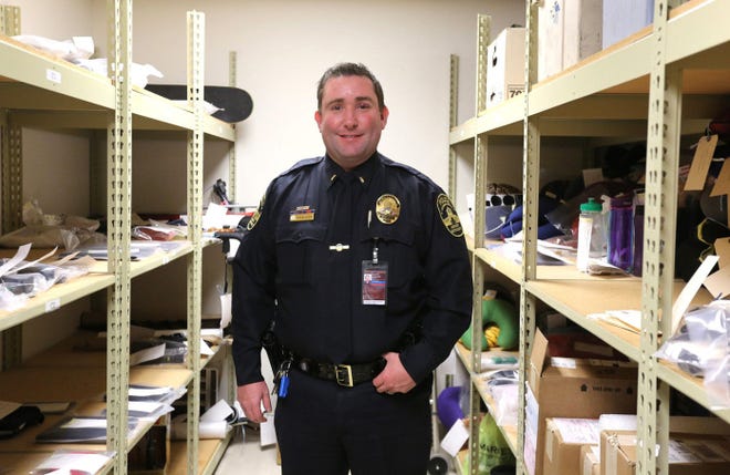 Lt. Scott Bekemeier of the airport police in the lost-and-found area at Port Columbus