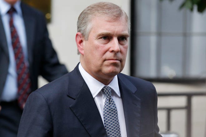 FILE- In this Wednesday, June 6, 2012 file photo, Britain's Prince Andrew leaves King Edward VII hospital in London after visiting his father Prince Philip. Reacting to U.S. court documents, royal officials issued a statement on Friday, Jan. 2, 2015 denying that Britain's Prince Andrew engaged in sexual impropriety with a minor. (AP Photo/Sang Tan, File)