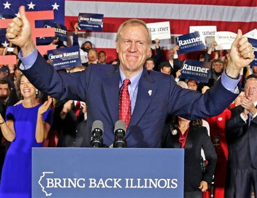 Republican gubernatorial candidate Bruce Rauner celebrates his win over Democratic Gov. Pat Quinn, Nov. 4 in Chicago. Rauner’s win gives the GOP control of Illinois’ executive branch for the first time in a decade. File/The Associated Press