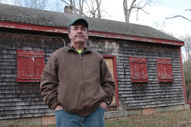 Don Bissonnette stands before the "Boy Scout House" that he plans to restore and preserve. Michael Smith/Standard Times Special