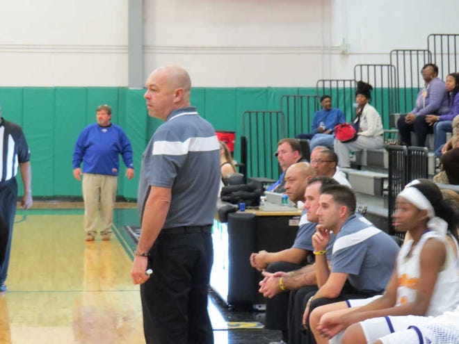 Jack Cavanaugh/Bluffton Today Reynoldsburg coach Jack Purtell, standing, coaches his team in its first appearance at the Bobcat Classic.