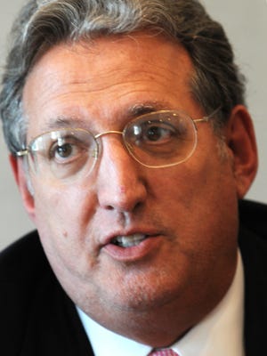 Dr. Richard Salluzzo took in $857,953 in fiscal year 2013, three years after resignation as CEO of Cape Cod Healthcare. Since he left in 2010 Cape Cod Healthcare has paid him $3 million. Cape Cod Times File/Jim Preston