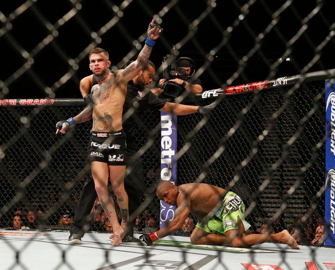 Uhrichsville native Cody Garbrandt celebrates after defeating Marcus Brimage in their bantamweight bout at UFC 182, Saturday, Jan. 3, 2015, in Las Vegas.