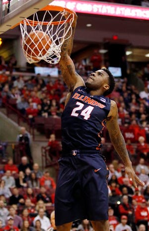 Illinois' Rayvonte Rice dunks the ball against Ohio State during the first half of an NCAA college basketball game in Columbus, Ohio, Saturday, Jan 3, 2015.