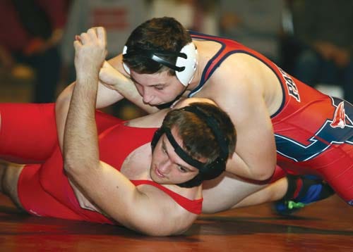 Photo by Marie Dirle/New Jersey Herald — Lenape Valley’s D.J. Barrett flips and pins High Point’s Kurt Rosner during their match on Tuesday night at Lenape Valley High School in Stanhope. The Patriots won, 39-31.
