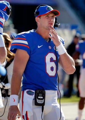 FILE - In this Nov. 1, 2014, file photo, Florida quarterback Jeff Driskel watches from the sidelines during the first half of an NCAA college football game in Jacksonville, Fla. Driskel has asked to be released from his scholarship, new Gators coach Jim McElwain said before Saturday's Birmingham Bowl against East Carolina. (AP Photo/Stephen B. Morton, File)