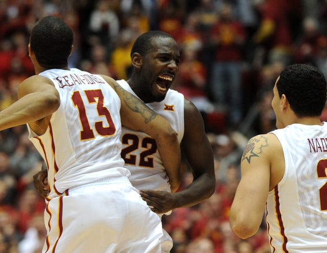 Iowa State's Bryce Dejan-Jones, left, Dustin Hogue and Abdel Nadel celebrate after a 63-61 win over Oklahoma State at Hilton Coliseum on Tuesday. Photo by Nirmalendu Majumdar/Ames Tribune 
 Iowa State's Jameel McKay dunks the ball between Oklahoma State's Travarius Shine, left, and Anthony Allen during the first half at Hilton Coliseum on Tuesday. Photo by Nirmalendu Majumdar/Ames Tribune 
 Iowa State's Monte Morris takes a shot around Oklahoma State's Jeffrey Carroll during a 63-61 win for the Cyclones on Tuesday. Photo by Nirmalendu Majumdar/Ames Tribune
 
 Iowa State's Matt Thomas takes a 3-point shot over Oklahoma State's Phil Forte during the first half on Tuesday. Photo by Nirmalendu Majumdar/Ames Tribune