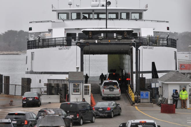 The Steamship Authority ferry loads up with cars and passengers in Woods Hole on Tuesday before its noontime sailing to Martha's Vineyard. Nearly 2,000 people have signed an online petition protesting increases to fares on the ferry line. Steve Heaslip/Cape Cod Times