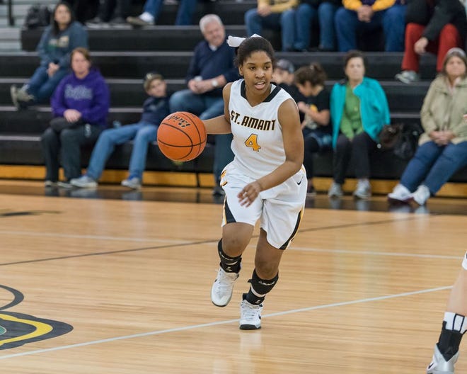 Ne'Kyla Williams led the Lady Gators with 16 in their loss to St. Michael. Photo by Dewey Keller.