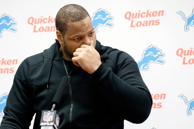 Detroit Lions defensive tackle Ndamukong Suh tries to regain his composure during a news conference after an NFL wildcard playoff football game against the Dallas Cowboys, Sunday, Jan. 4, 2015, in Arlington, Texas. The Cowboys won 24-20. (AP Photo/Tony Gutierrez)