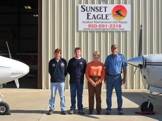 The Hall family, from left are Matthew Hall, Mitchell Hall, Linda Hall and Michael Hall, owns and operates Sunset Eagle Aviation, an aviation maintenance business at the Calhoun County Airport.