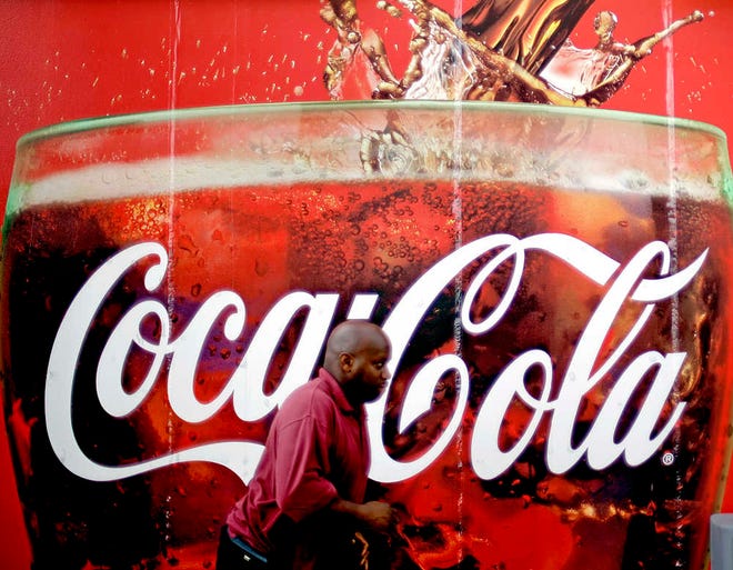 Coca-Cola on Thursday said it's cutting between 1,600 and 1,800 jobs globally as part of an ongoing push to trim costs.