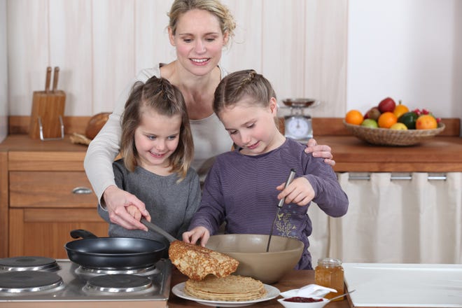 One no-tech, fun thing to do at home with your kids is to make breakfast together. (Fotolia)