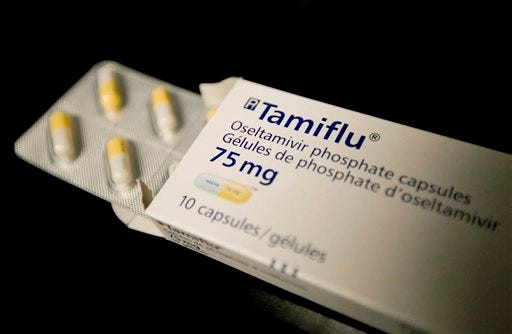 This April 30, 2009, file photo shows a box of Tamiflu in a Toronto health clinic. The Centers for Disease Control and Prevention on Friday, Jan. 9. 2015, sent a new alert to doctors, advising prompt use of Tamiflu and other antivirals for hospitalized flu patients and those at higher risk for complications like pneumonia. (AP Photo/The Canadian Press, Darren Calabrese, File)