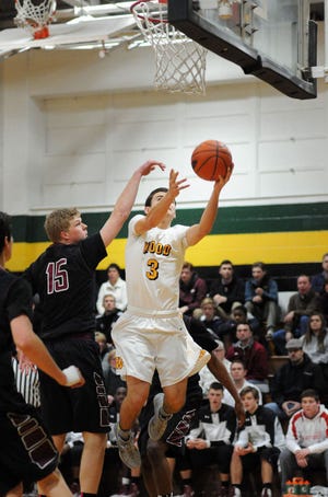 WARMINSTER, PA. - JANUARY 9: Saint Joseph Prep's Pete Gayhardt #15 defends as Archbishop Wood's Tommy Funk #3 drives towards the basket in the first quarter at Archbishop Wood High School January 9, 2015 in Warminster, Pennsylvania. (Photo by William Thomas Cain/Cain Images)