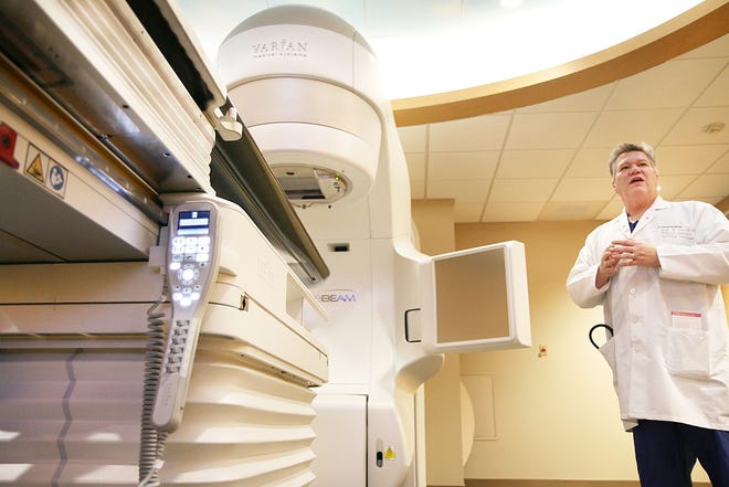 Dr. Gary Proulx, medical director, Radiation Oncology, at The Center for Cancer Care at Exeter Hospital, talks about the new high-tech linear accelerator currently under testing and set to go online in March 2015.

Photo by Rich Beauchesne/Seacoastonline