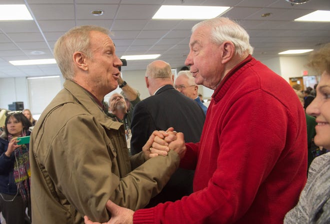 Illinois Gov.-elect Bruce Rauner, left, greets Chillicothe city councilman Jim Thornton during a visit Friday, Jan. 9, 2014 to the Pearce Community Center in Chillicothe. David Zalaznik/Gatehouse News Service