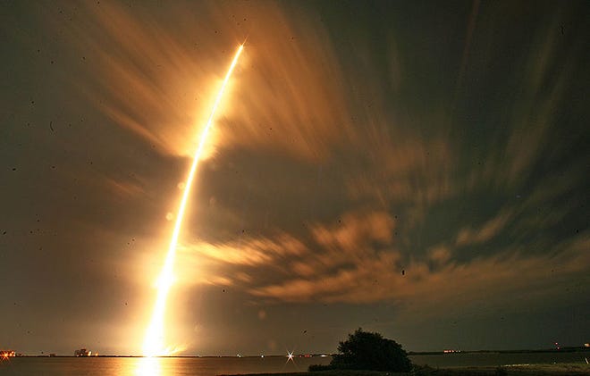 A SpaceX Falcon 9 steaks off from launchPad 40, at Cape Canaveral Air Force Station.