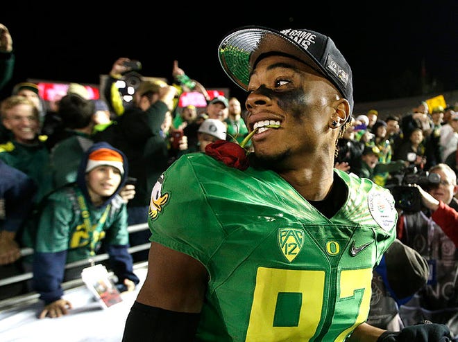 Oregon wide receiver Darren Carrington celebrates his team's Rose Bowl victory over Florida State. He led the Ducks with seven catches for 165 yards and two touchdowns